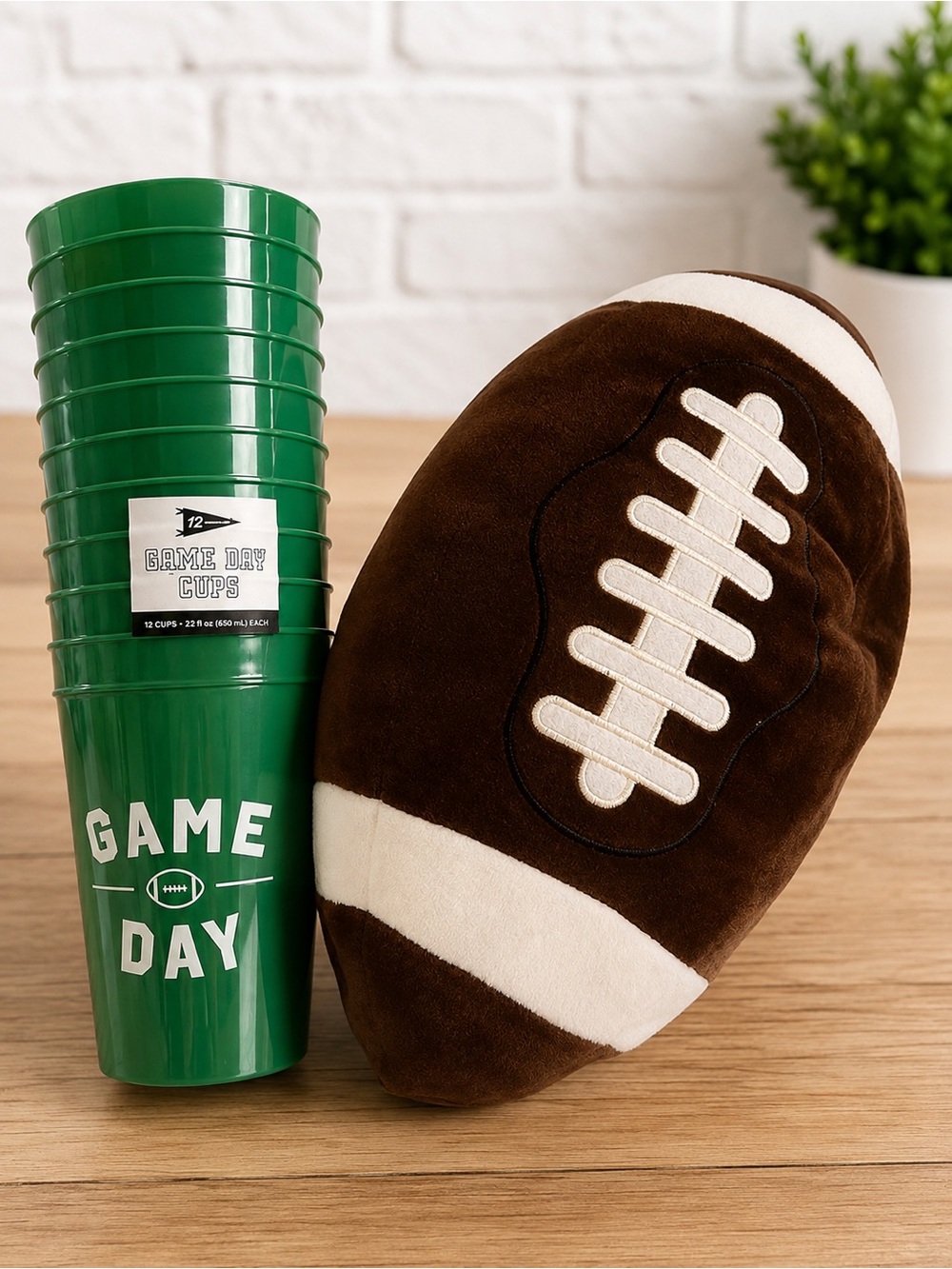 Pack of 12 game reusable party cups and plush football